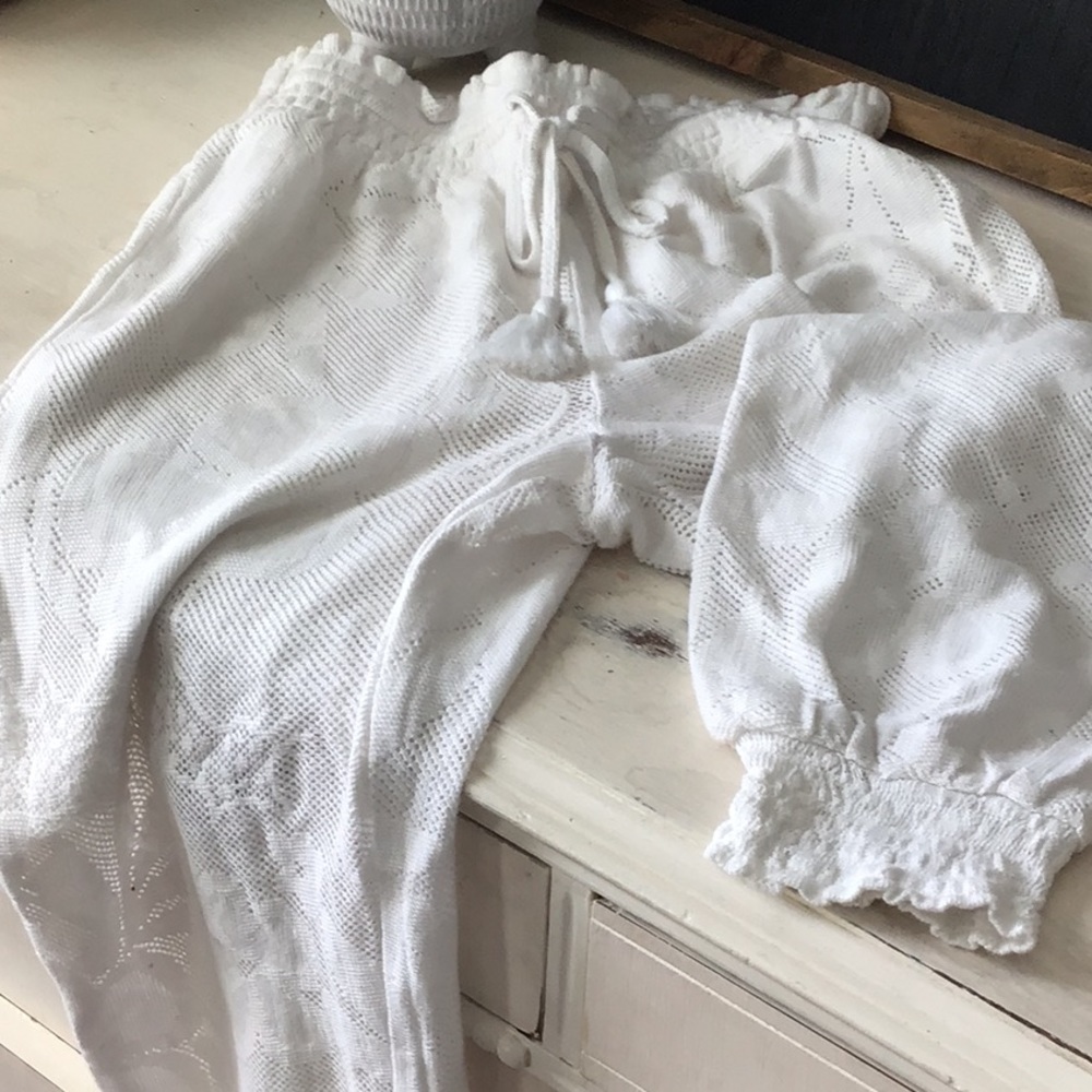 White jogger crochet coverup.
